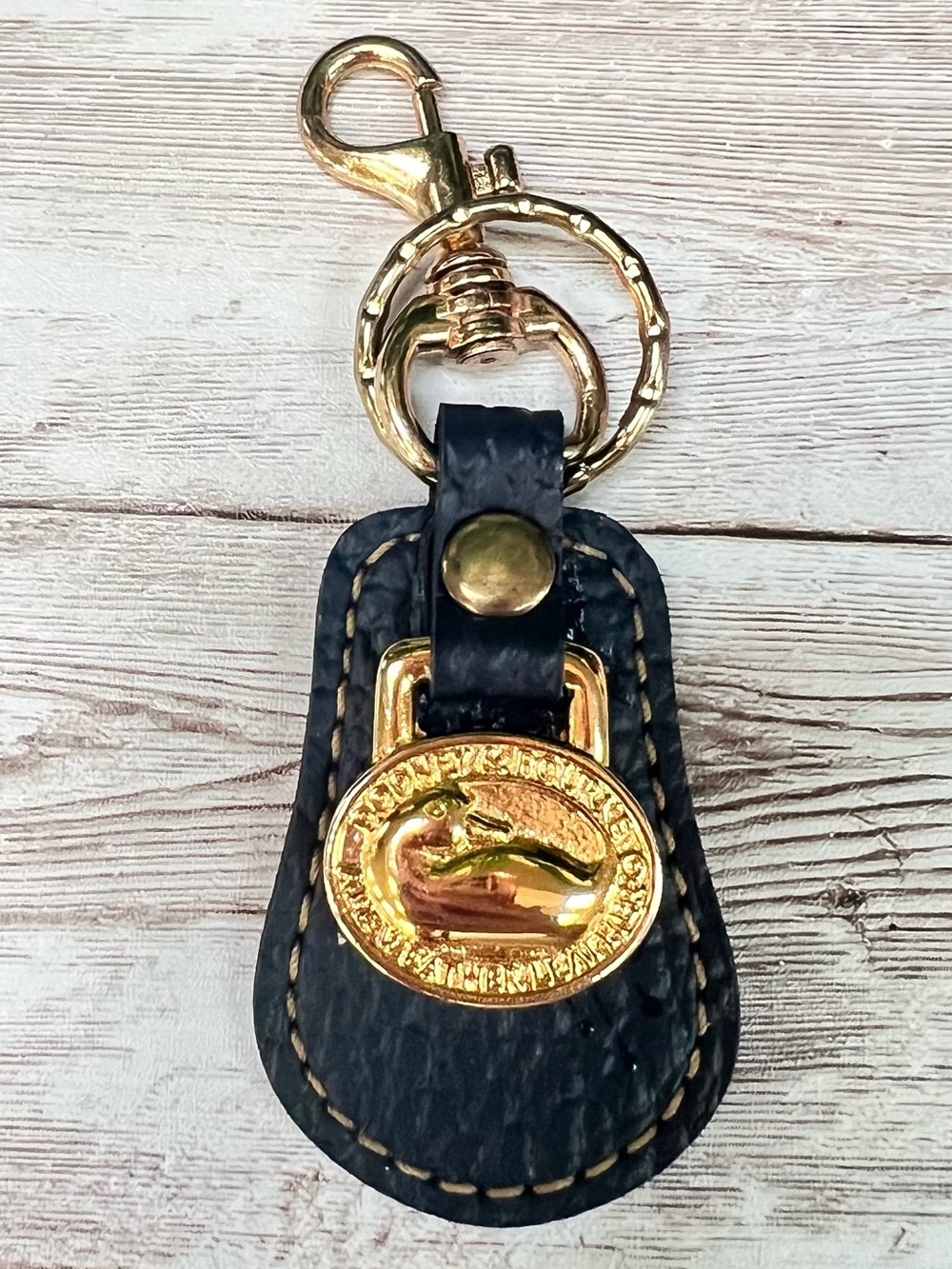 Dooney and Bourke Navy Leather Key Fob with Brass Accent